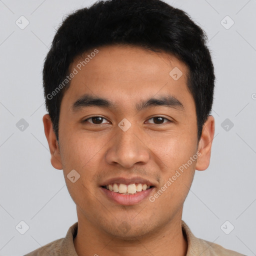 Joyful latino young-adult male with short  black hair and brown eyes