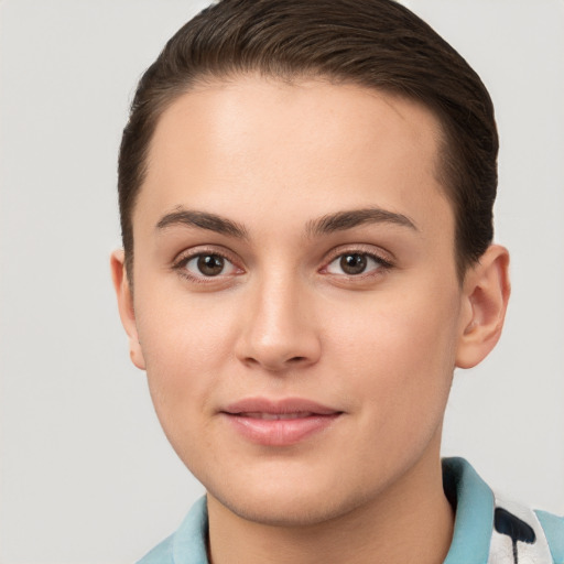 Joyful white young-adult female with short  brown hair and brown eyes