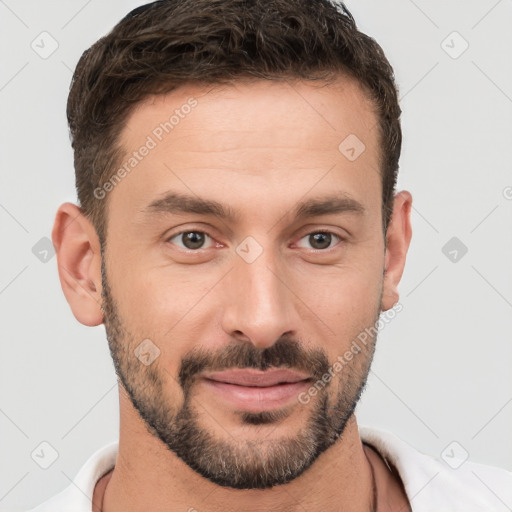 Joyful white young-adult male with short  brown hair and brown eyes