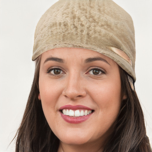 Joyful white young-adult female with long  brown hair and grey eyes