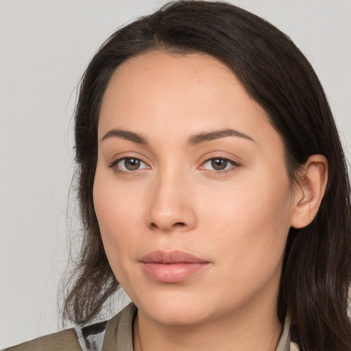 Neutral white young-adult female with long  brown hair and brown eyes