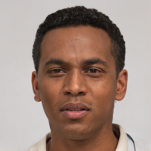 Neutral black young-adult male with short  black hair and brown eyes