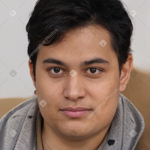 Joyful latino young-adult male with short  brown hair and brown eyes