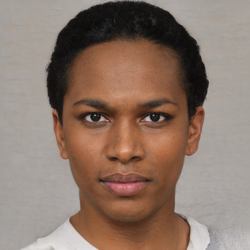 Neutral black young-adult female with short  black hair and brown eyes