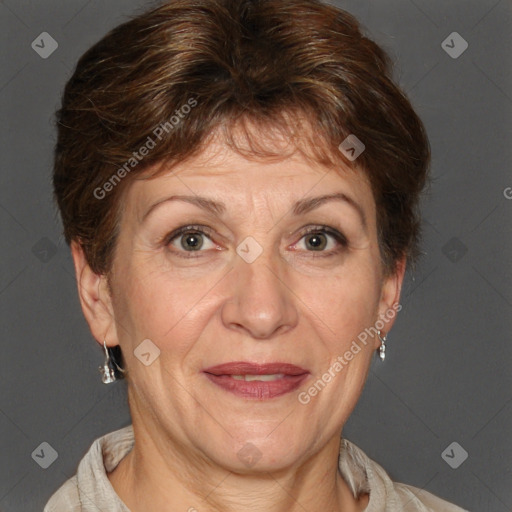 Joyful white adult female with short  brown hair and grey eyes