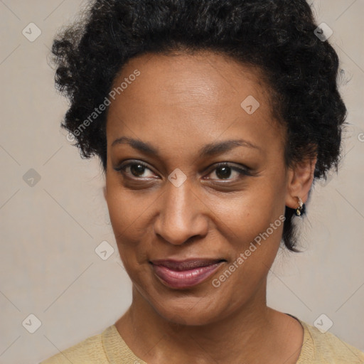 Joyful black adult female with short  brown hair and brown eyes