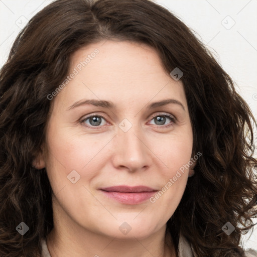 Joyful white young-adult female with long  brown hair and green eyes