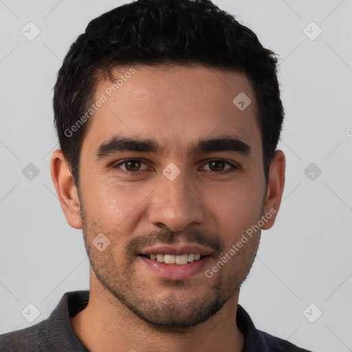 Joyful white young-adult male with short  black hair and brown eyes