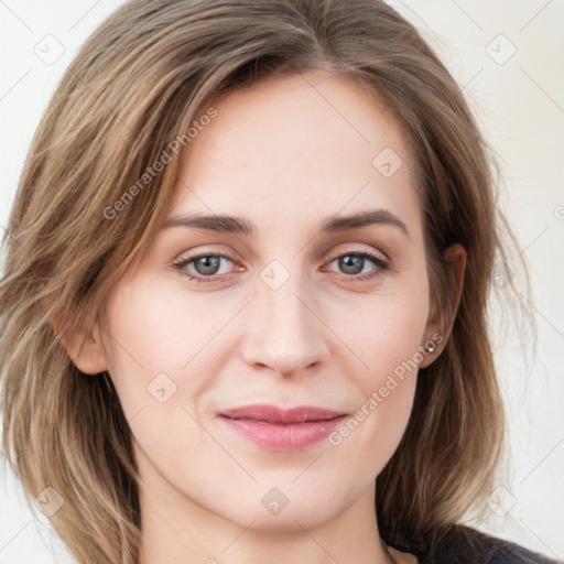 Joyful white young-adult female with medium  brown hair and blue eyes