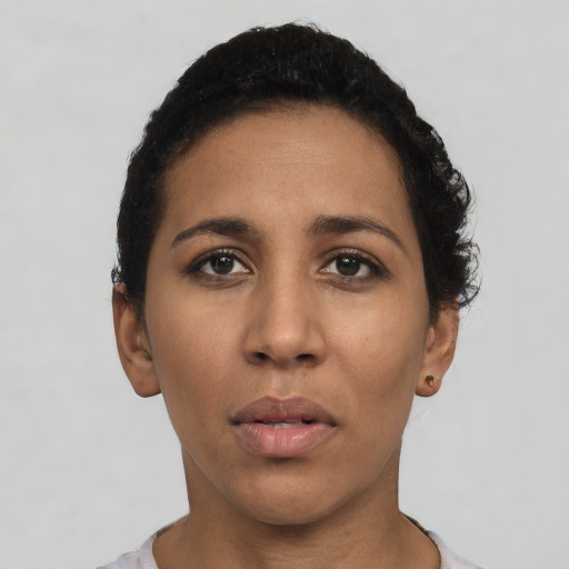 Neutral latino young-adult female with short  black hair and brown eyes
