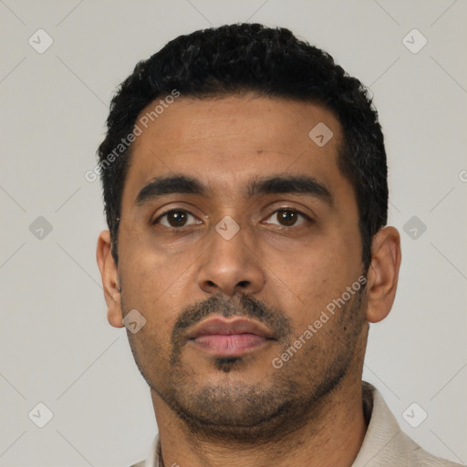 Neutral latino young-adult male with short  black hair and brown eyes