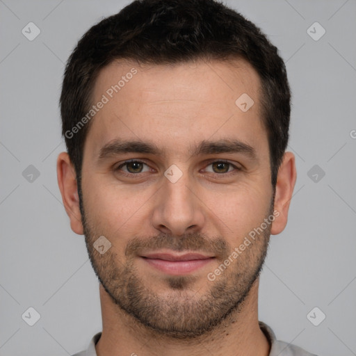 Joyful white young-adult male with short  brown hair and brown eyes