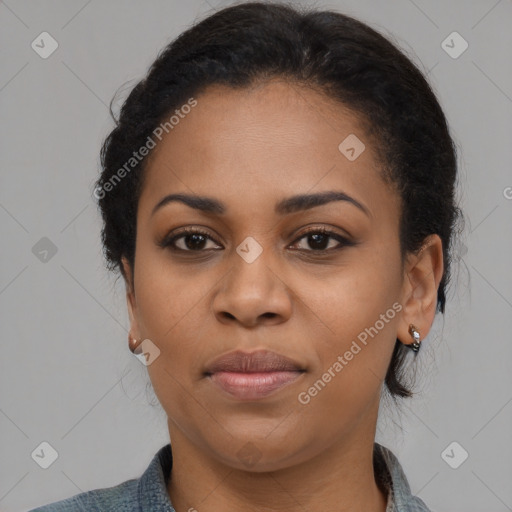 Joyful black young-adult female with medium  brown hair and brown eyes