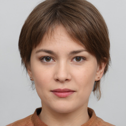 Neutral white young-adult female with medium  brown hair and brown eyes