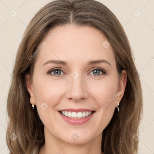 Joyful white young-adult female with long  brown hair and green eyes