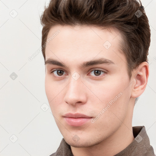 Neutral white young-adult male with short  brown hair and grey eyes