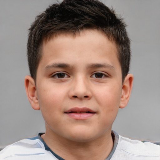 Joyful white child male with short  brown hair and brown eyes