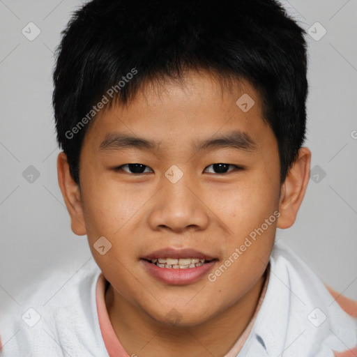 Joyful asian child male with short  brown hair and brown eyes