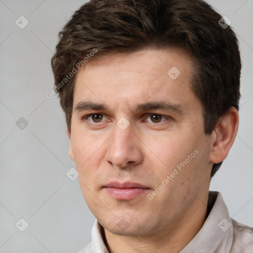 Neutral white adult male with short  brown hair and brown eyes