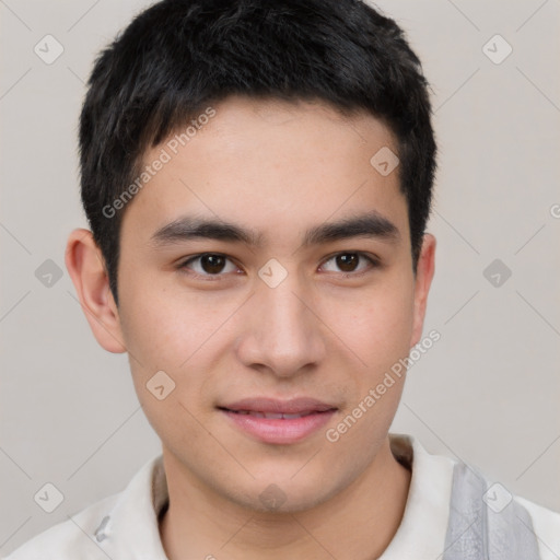 Joyful white young-adult male with short  black hair and brown eyes