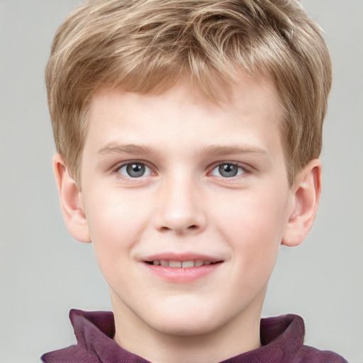 Joyful white child male with short  brown hair and grey eyes