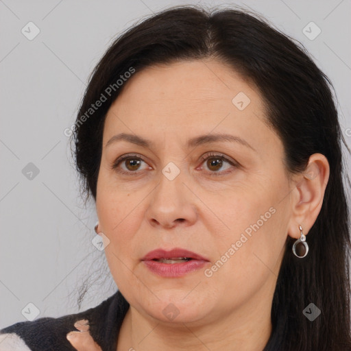 Joyful white adult female with medium  brown hair and brown eyes