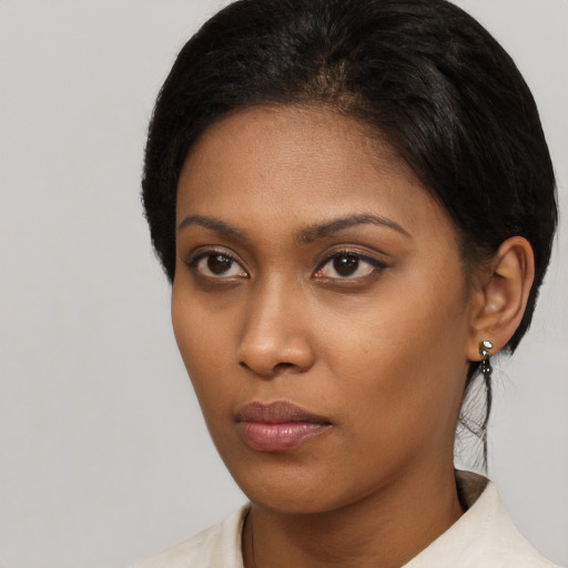 Neutral asian young-adult female with medium  brown hair and brown eyes