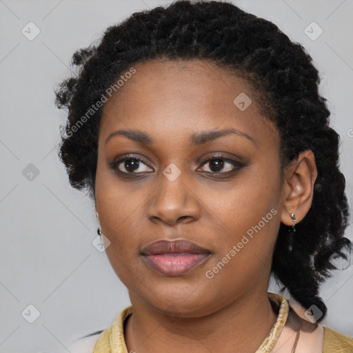 Joyful black young-adult female with long  brown hair and brown eyes