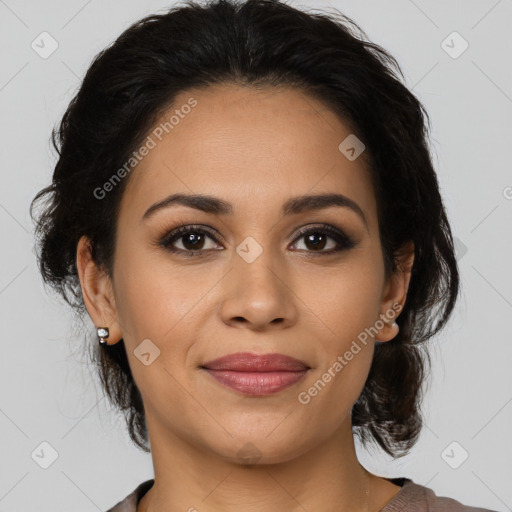 Joyful latino young-adult female with medium  brown hair and brown eyes