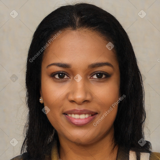Joyful black young-adult female with long  brown hair and brown eyes
