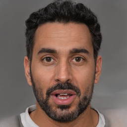 Neutral white adult male with short  black hair and brown eyes