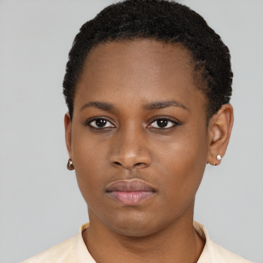 Neutral black young-adult female with short  brown hair and brown eyes