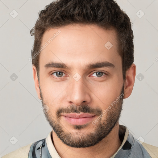 Neutral white young-adult male with short  brown hair and brown eyes