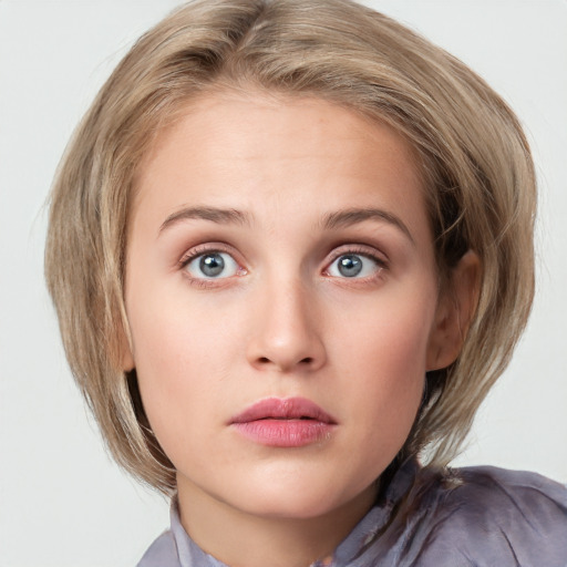 Neutral white young-adult female with medium  brown hair and blue eyes