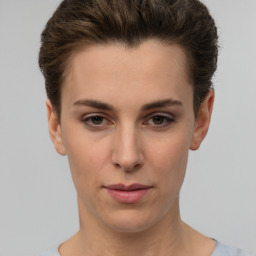 Neutral white young-adult female with short  brown hair and brown eyes