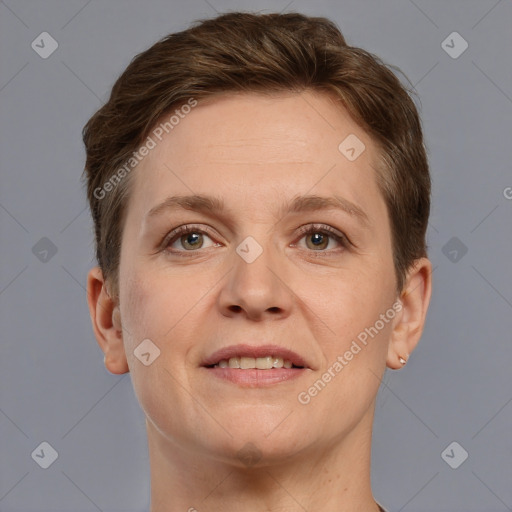 Joyful white adult female with short  brown hair and grey eyes