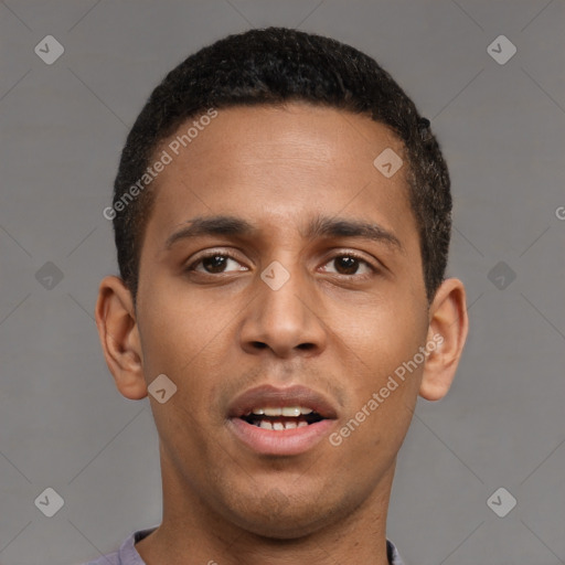 Joyful latino young-adult male with short  brown hair and brown eyes