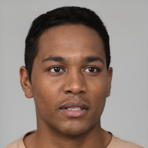 Neutral black young-adult male with short  black hair and brown eyes