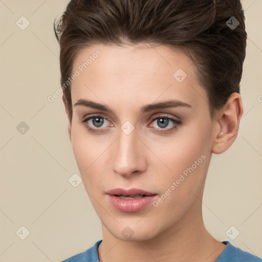 Neutral white young-adult female with short  brown hair and brown eyes