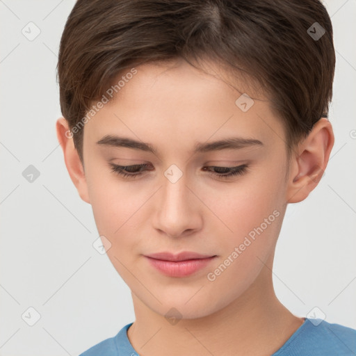 Joyful white child female with short  brown hair and brown eyes