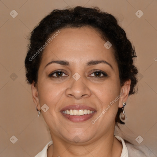 Joyful latino adult female with short  brown hair and brown eyes