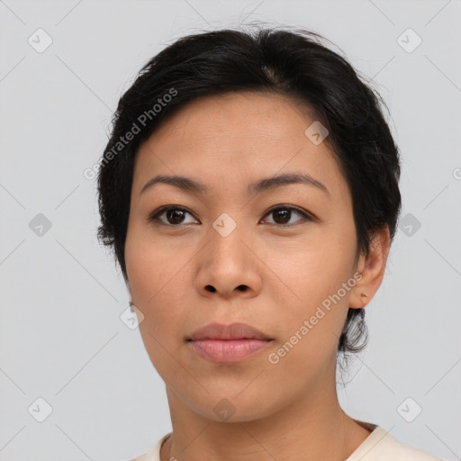 Neutral asian young-adult female with medium  brown hair and brown eyes