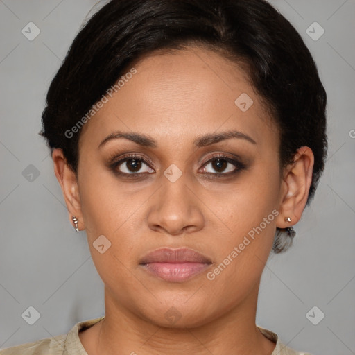 Joyful latino young-adult female with medium  brown hair and brown eyes