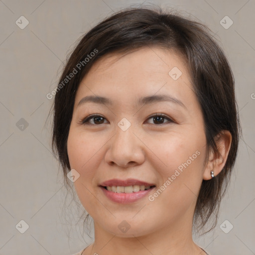 Joyful white young-adult female with medium  brown hair and brown eyes