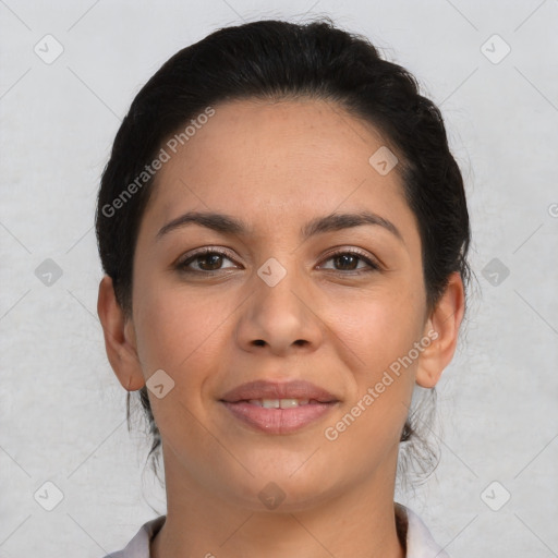 Joyful latino young-adult female with short  brown hair and brown eyes