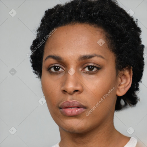 Neutral black young-adult female with short  black hair and brown eyes