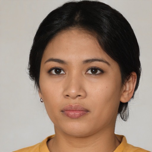 Neutral asian young-adult female with medium  black hair and brown eyes