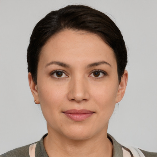Joyful white young-adult female with short  brown hair and brown eyes