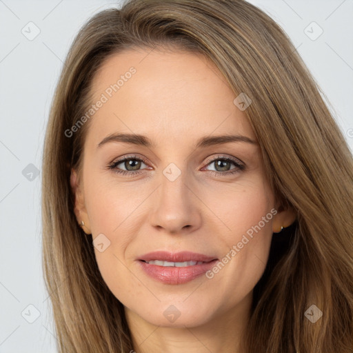 Joyful white adult female with long  brown hair and brown eyes