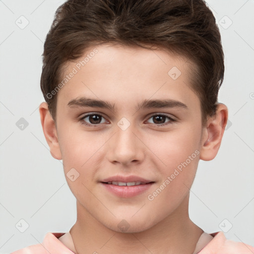 Joyful white child male with short  brown hair and brown eyes